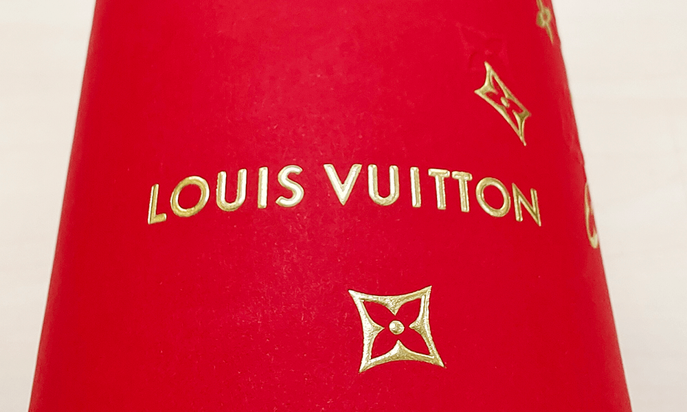 Logo Finishes on Paper Packaging  of Embossed Hot Foil Logo